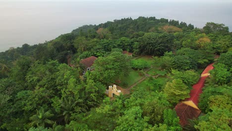 aerial view from roça belo monte with the sea as backgroud in ilha do principe (prince island) são tomé,africa - circular drone shot