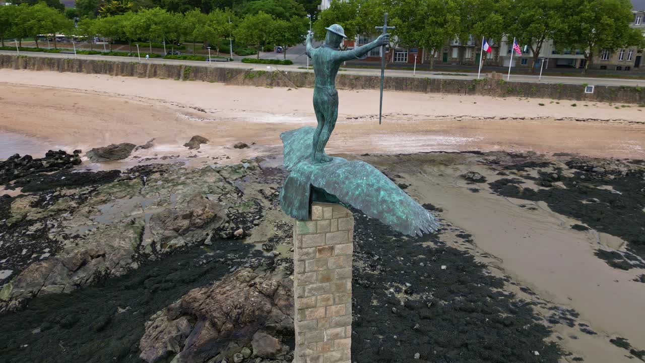 Drone orbit around the seaside American monument bronze statue aka Le Sammy, Saint-Nazaire, Loire-Atlantique, France