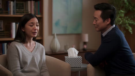 woman crying during a counseling or therapy session