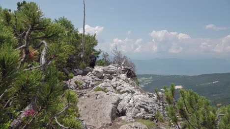 Man Hiking on a Rocky Mountain Trail