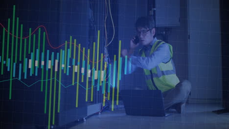 male it technician crouching in server room, checking network cables, showing bar and line graphs