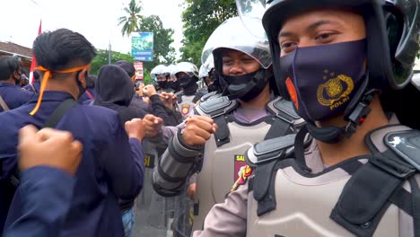 protesters and police after demonstration against omnibus law magelang indonesia