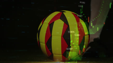 animation of graphs with numbers over low section of soccer player kicking ball with belgium flag