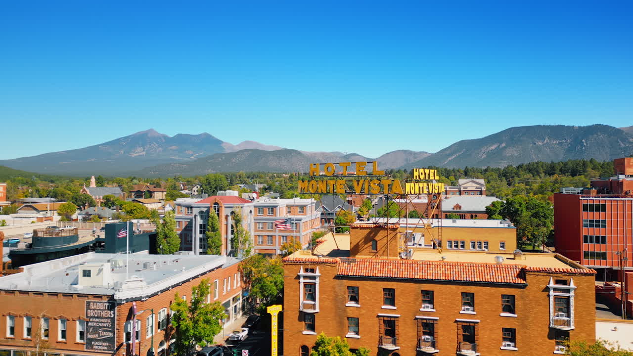 Flagstaff, USA, 24 August 2025: Footage at the building of a hotel in Flagstaff, Arizona, USA. Aerial perspective on the city surrounded by the mountain range
