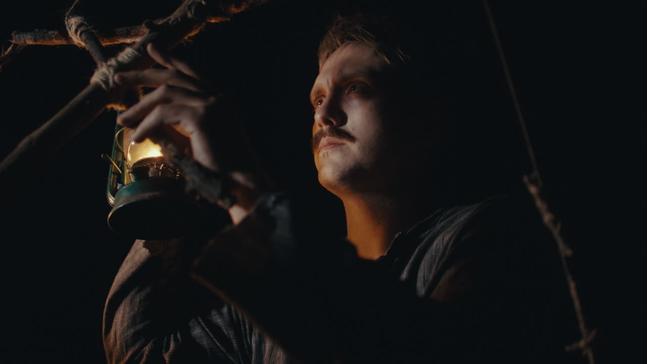 Man with a Lantern in the Dark