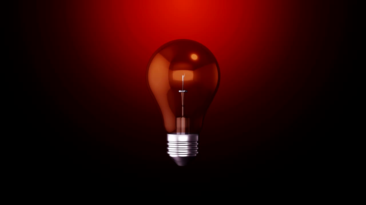 Light bulb turns on and off and rotating on dark background