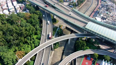 massive highway interchange with traffic on all levels in downtown hong kong, aerial view