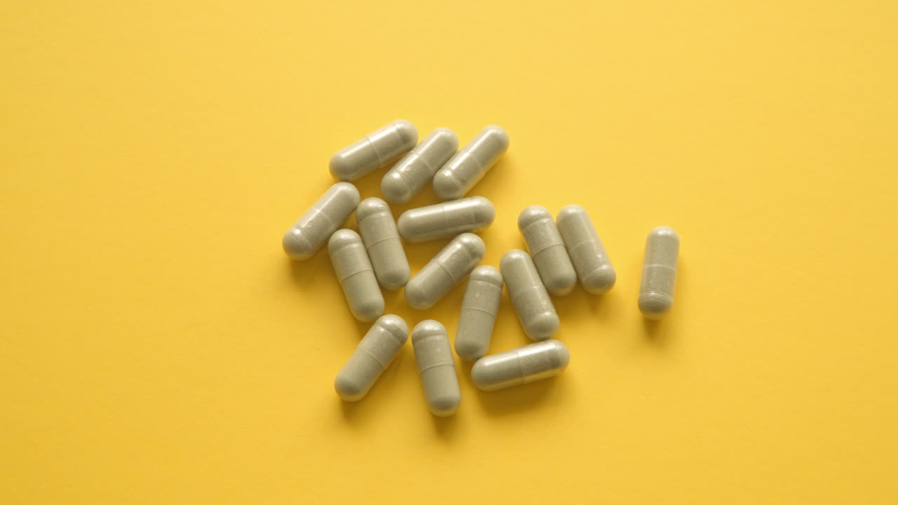 Lions Mane Supplement Pill From Yellow Table