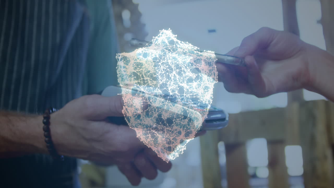 animación de la red de conexiones con escudo de seguridad sobre las personas que utilizan el terminal de pago