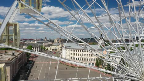 ferris wheel over cityscape