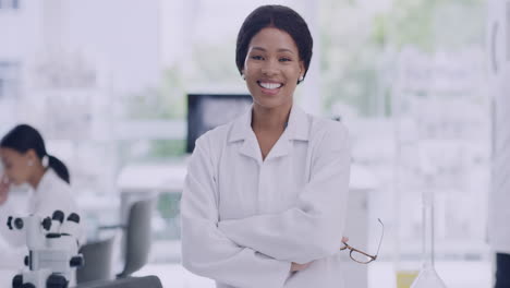 portrait of a young scientist removing glasses