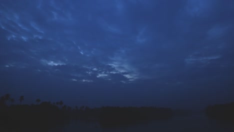 sunrise on river kerala , hand held shot, blue sky