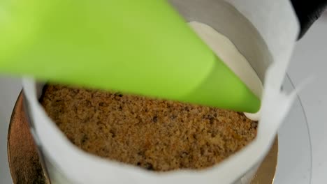 process of making cake in candy store. cooking cake with cream
