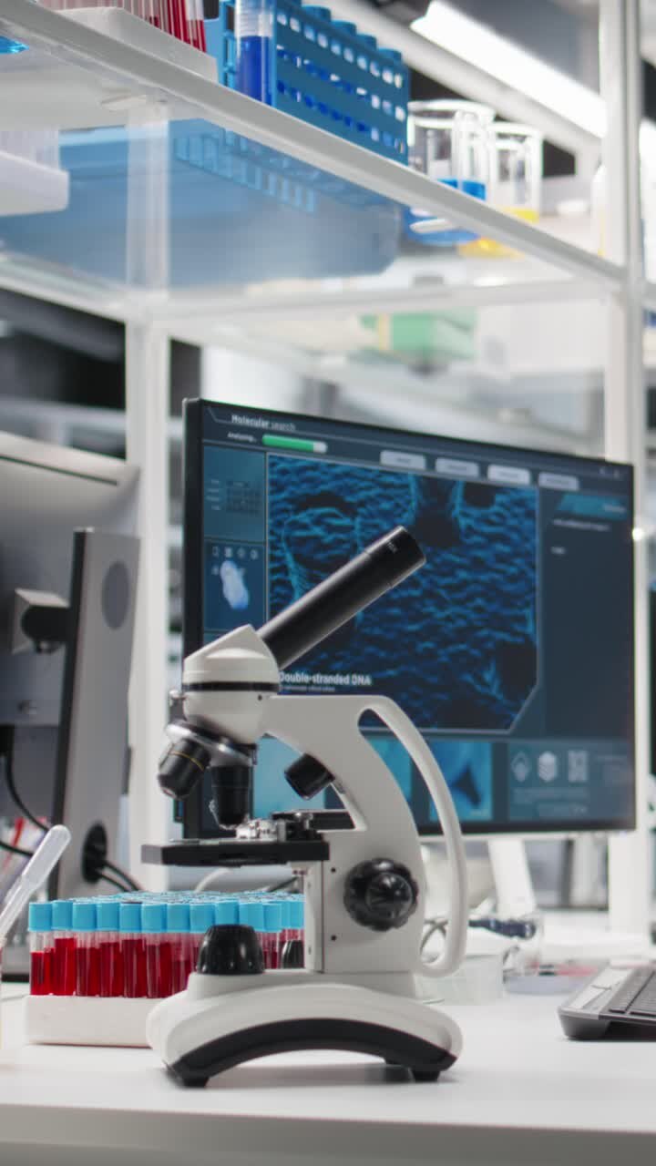 Vertical video Scientific microscope in medical laboratory used for cellular analysis