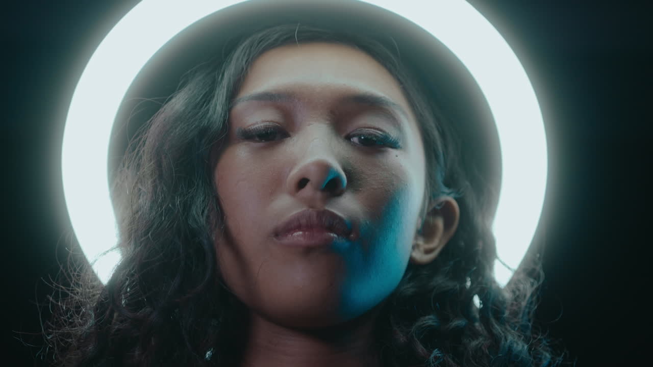 Young Girl Portrait against Ring Light