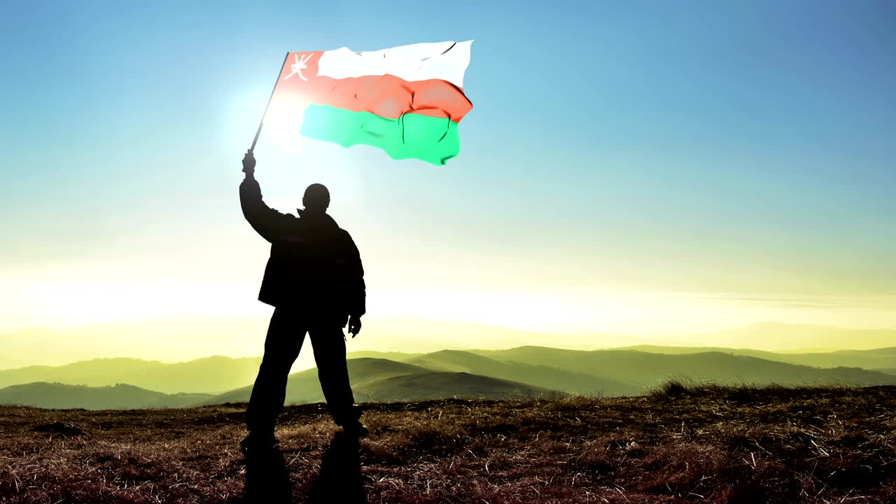 성공적인 실루 남자 우승자 산 꼭대기에서 오만 발을 흔들고, 시네마그래프 루프 배경