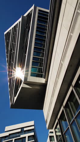 modern architectural buildings against a blue sky