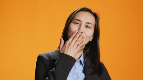 exhausted person in formal clothes yawning