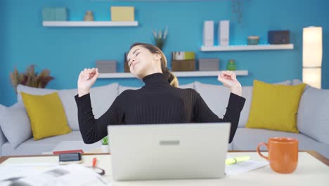 Young-entrepreneur-woman-working-in-home-office-is-relaxing-and-finding-peace.