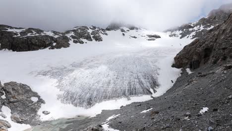 fellaria glacier on cloudy day, valmalenco in italy