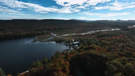 Aerial-View-Of-Road-Bridge-And-Wetlands-Near-Raquette-Lake-In-Hamilton-County,-New-York,-United-States