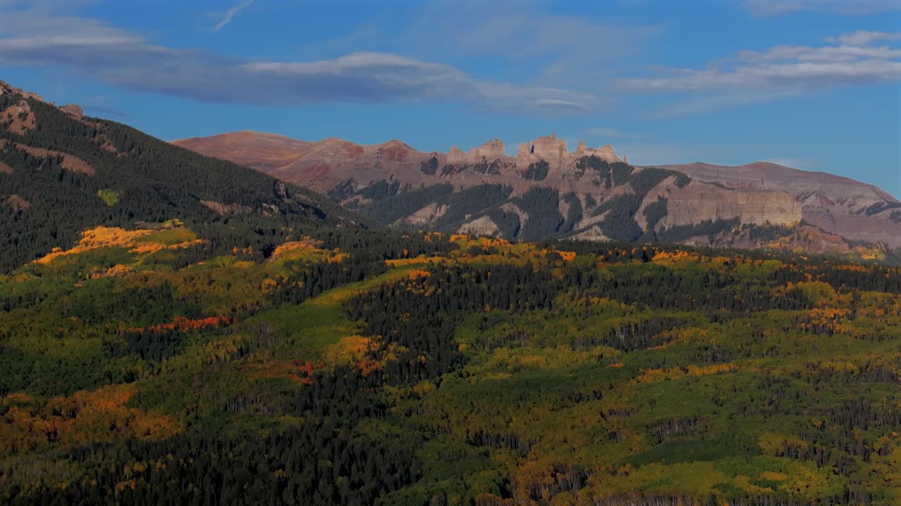 Autumn fall Mill Castle Mountain aerial drone Colorado morning sunrise clear blue sky clouds Gunnison Crested Butte Ohio Swampy Kebler Pass Mount Axtell Ohio Peak panorama landscape upwards