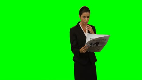 Businesswoman-reading-newspaper