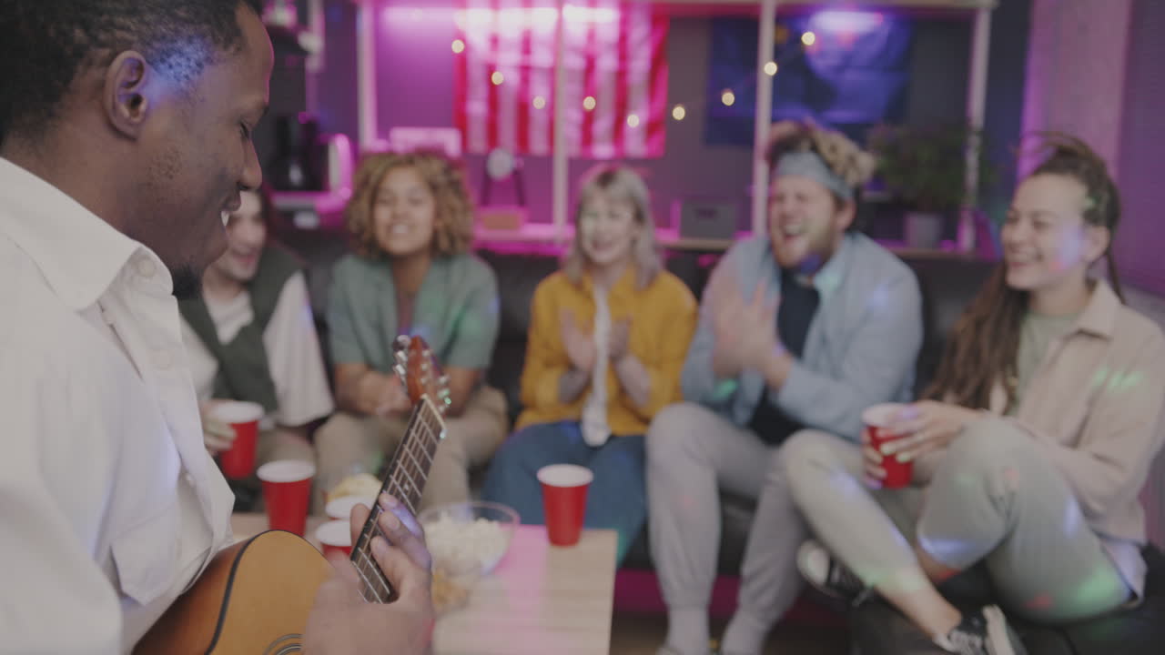 Friends Having a Fun Party with Music