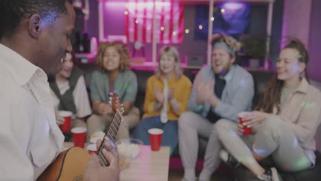 friends having a fun party with music