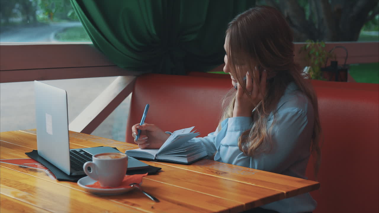 Woman working in a cafe