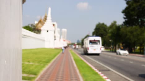 blurred street view of grand palace, bangkok