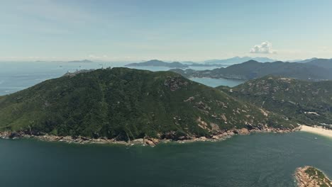 mountain on island in shek o, hong kong, aerial drone view