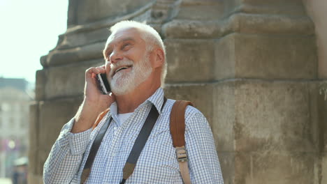 senior tourist with photocamera and map 1