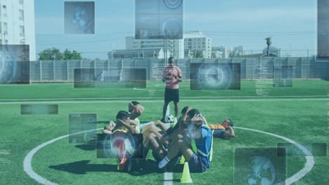 Animation-of-scopes-and-data-processing-on-screens-over-male-football-players-doing-push-ups