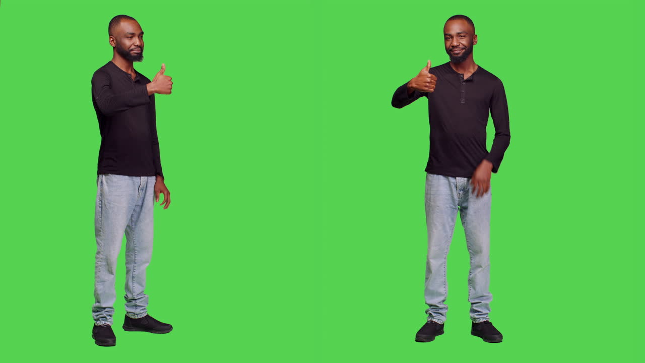 Man giving thumbs up on green screen