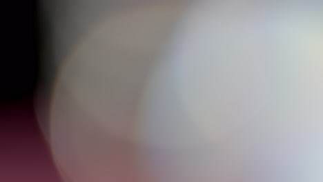 la luz multicolor filtra imágenes de 4k sobre fondo negro, vídeo estilizado, transiciones, efecto bokeh