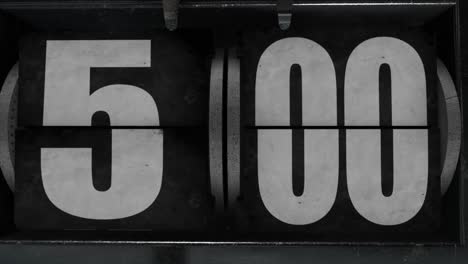 High quality CGI render of an old style industrial looking flip clock ticking over from 4