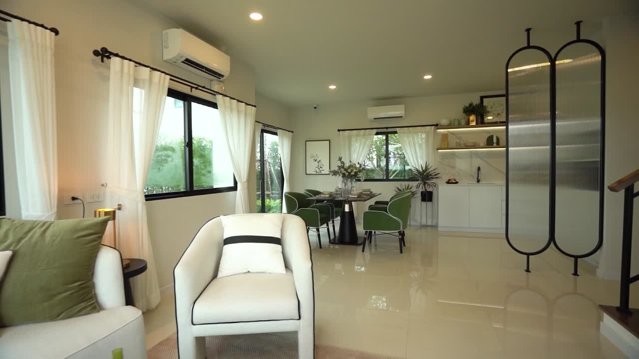 현대적이고 멋진 회색과 초록색 오픈 플랜 홈 인테리어 디자인