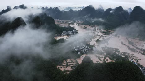 china flooding in remote karst mountain landscape, guangxi natural disaster, aerial