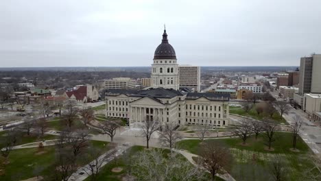 kansas state capitol building in topeka, kansas with drone video moving in a circle