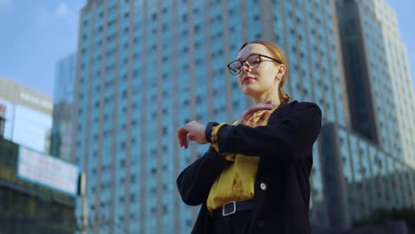 Confident-proud-young-adult-businesswoman-crossing-arms-with