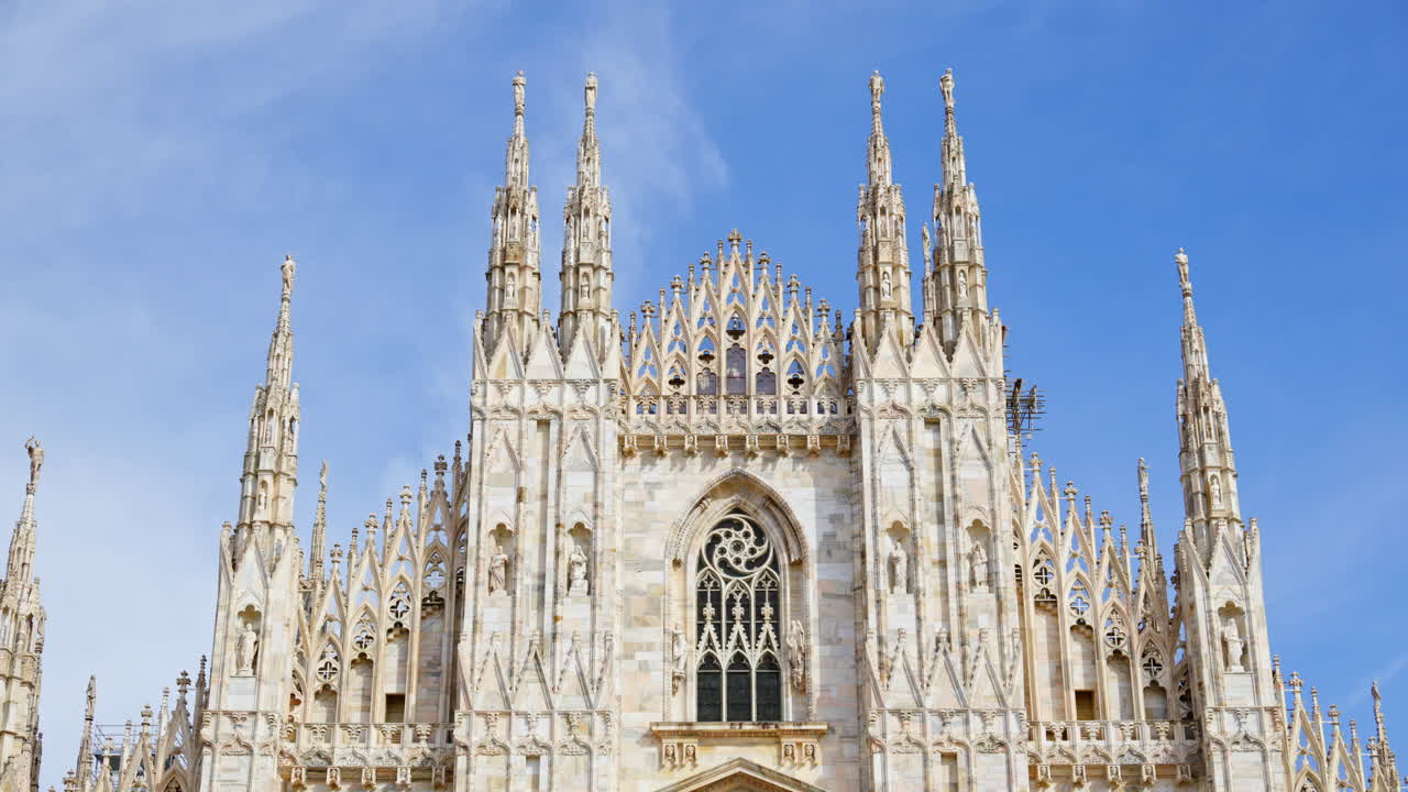 View of the Milan Cathedral in Italy over a blue sky in daylight