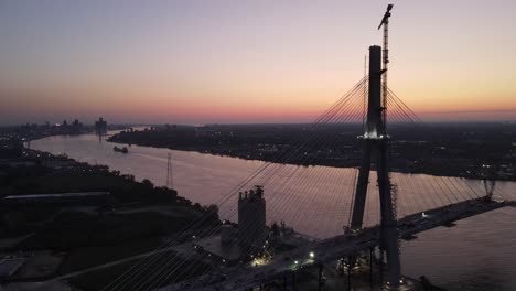 aerial view of gordie howe international bridge under construction over the detroit river