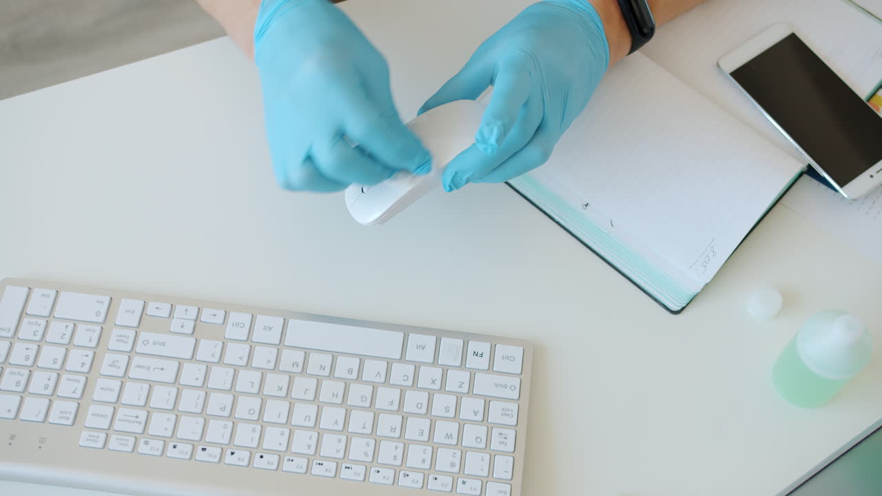 Cleaning a Workstation with Gloves