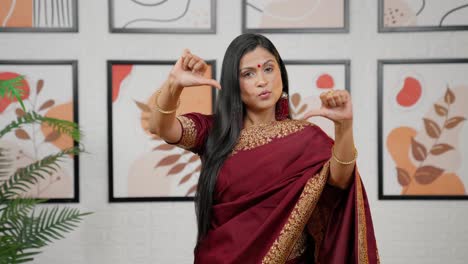 indian woman booing and making fun