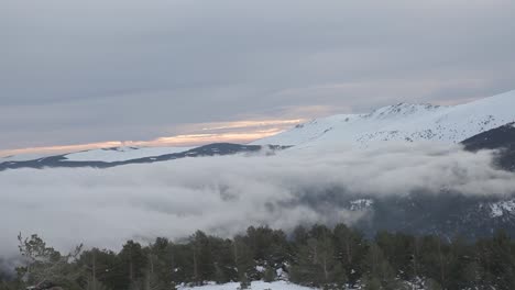 Time-Lapse-clouds-in-the-mountains,-forest-at-the-background,-Spain,-static-shot