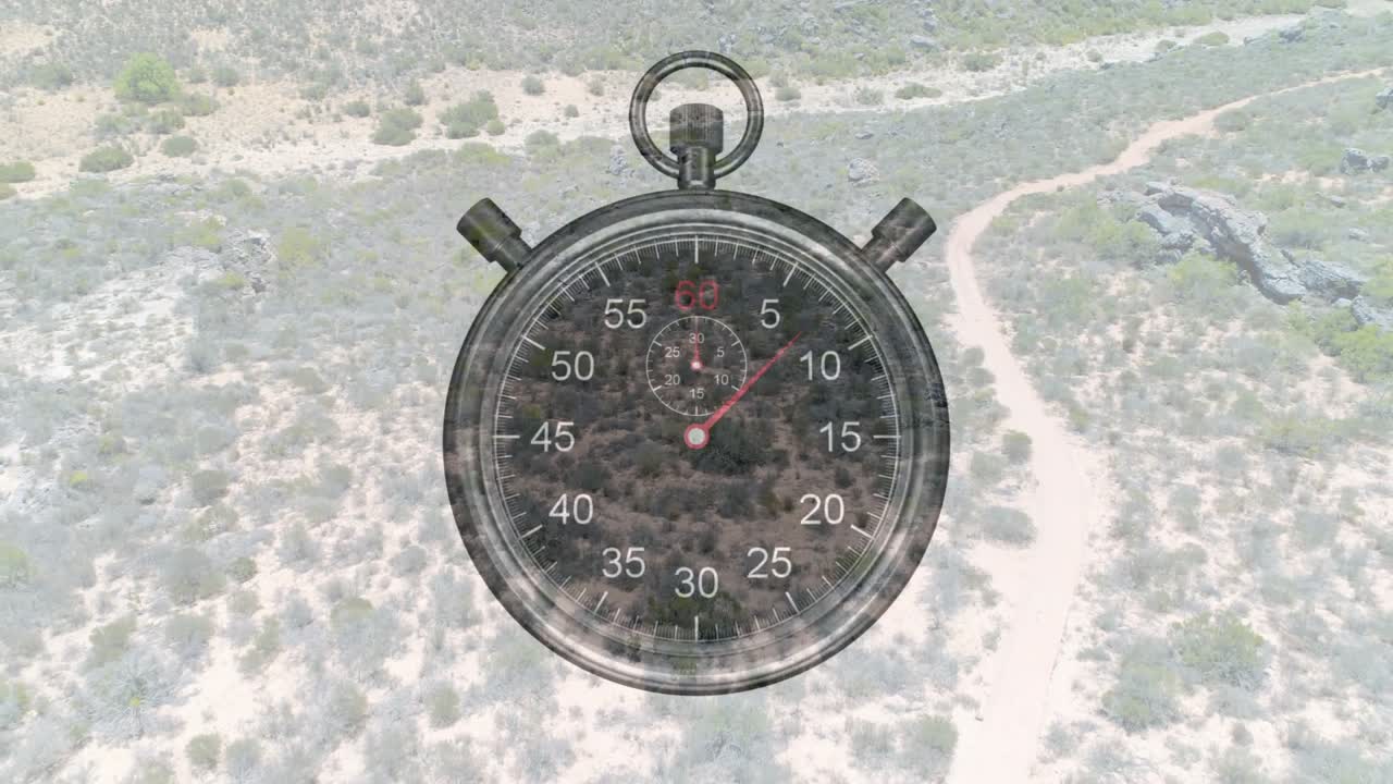 Cronometro che parte, lancetta dei secondi che avanza, terreno che si sposta e la telecamera si allontana per mostrare il tempo.