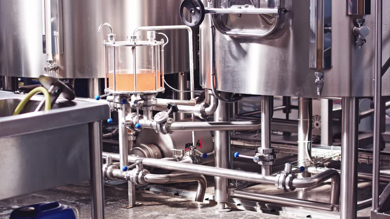 Modern Beer Factory. Steel tanks for beer fermentation and maturation.