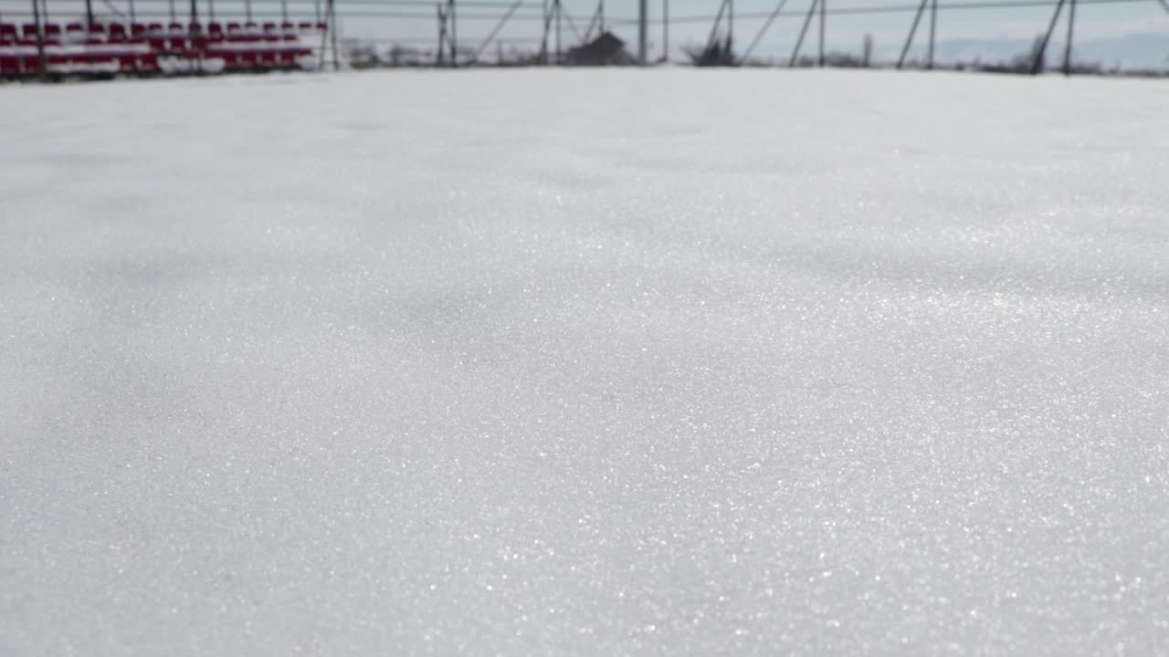 Crystal snow sparkling bright from the sun on a sunny winter day. Natural beauty.