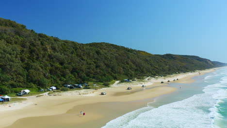 Aerial-View-Of-Car-Convoy-Driving-On-Sandy